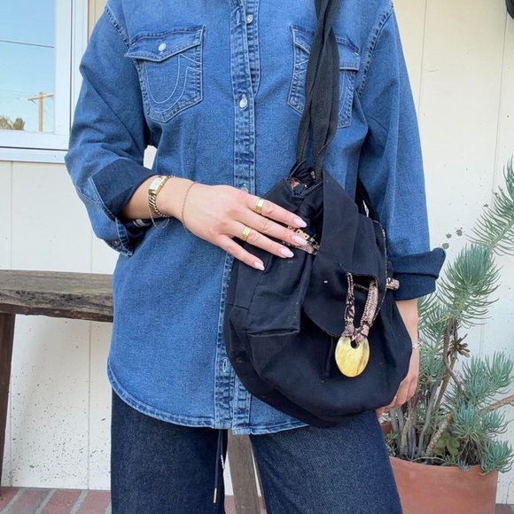 Handmade artisan black boho shoulder bag with large from button